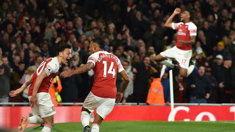Mesut Ozil and Pierre-Emerick Aubameyang celebrate Arsenal&#39;s stunning third goal
