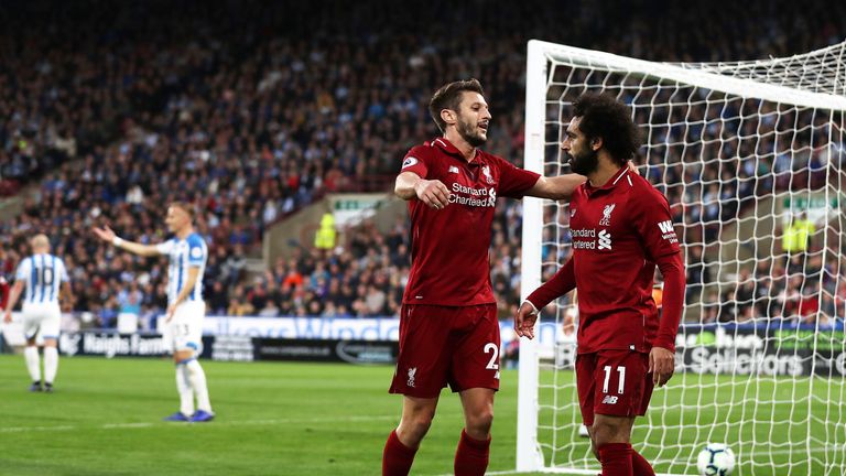 Mohamed Salah is congratulated by Adam Lallana after putting Liverpool 1-0 up