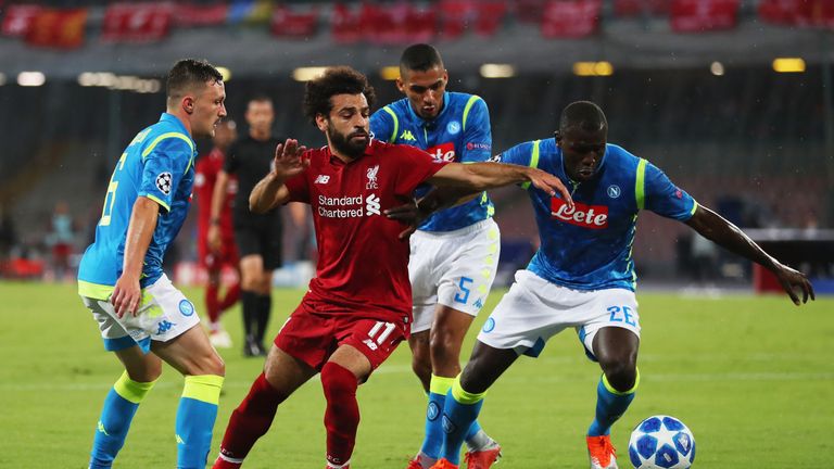 Mohamed Salah is surrounded in Napoli
