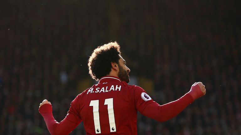 Mohamed Salah celebrates after putting Liverpool 1-0 up against Cardiff City