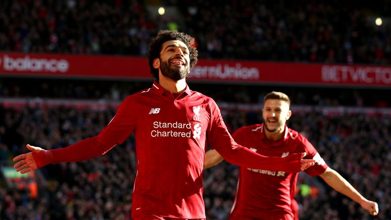 Mohamed Salah celebrates after putting Liverpool 1-0 up against Cardiff City