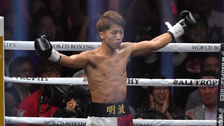   Champion Naoya Inoue of Japan celebrates defeating Challenger Juan Carlos Payano of the Dominican Republic  in round onees)