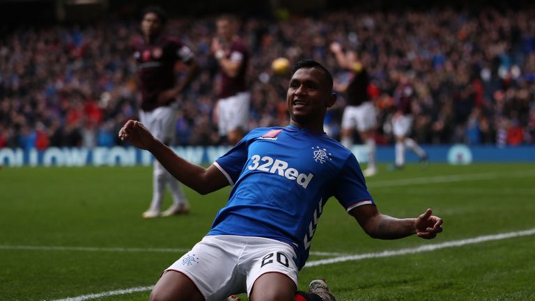 Alfredo Morelos slides on his knees after doubling Rangers' lead on Sunday