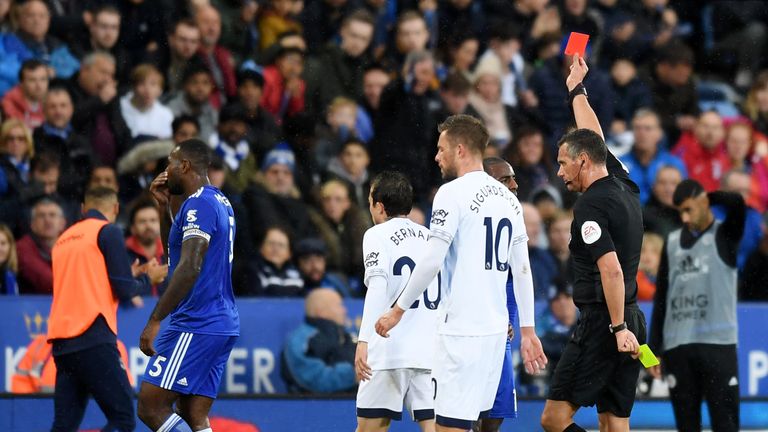 Leicester captain Wes Morgan is sent off for a second bookable offence on Richarlison