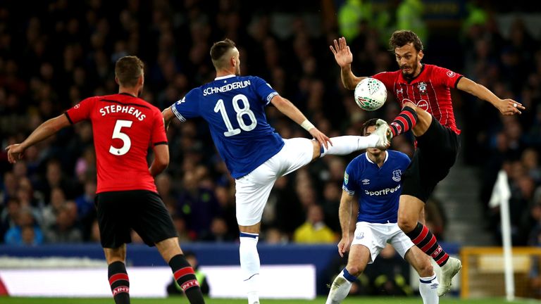Morgan Schneiderlin of Everton battles for possession with Manolo Gabbiadini of Southampton during the Carabao Cup Third Round match between Everton and Southampton at Goodison Park on October 2, 2018 in Liverpool, England