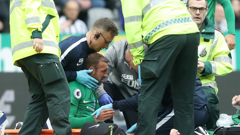 Glenn Murray receives treatment at St James' Park