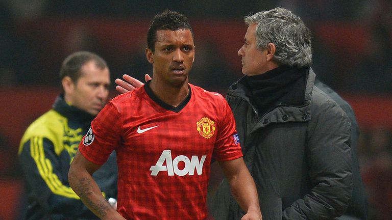Real Madrid boss Jose Mourinho consoles a shocked Nani after his red card