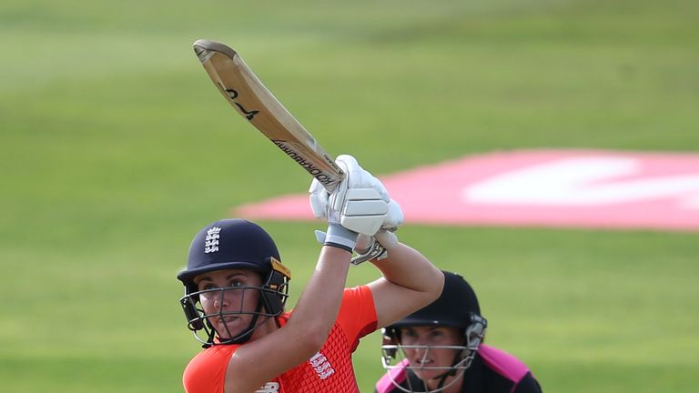 TAUNTON, ENGLAND - JUNE 23: Katey Martin of New Zealand looks on as Nat Sciver of England hits out during the International T20 Tri-Series match between England Women and New Zealand Women at The Cooper Associates County Ground on June 23, 2018 in Taunton, England. (Photo by Julian Herbert/Getty Images)