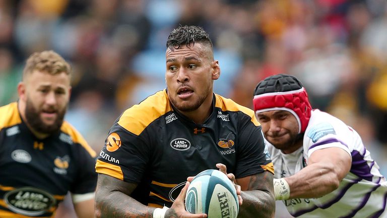 Nathan Hughes (centre) in action for Wasps against Gloucester