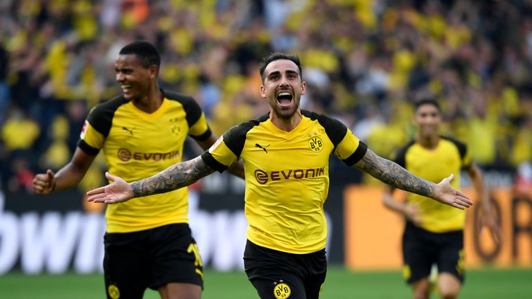 Paco Alcacer scored a hat-trick as Borussia Dortmund defeated Augsburg