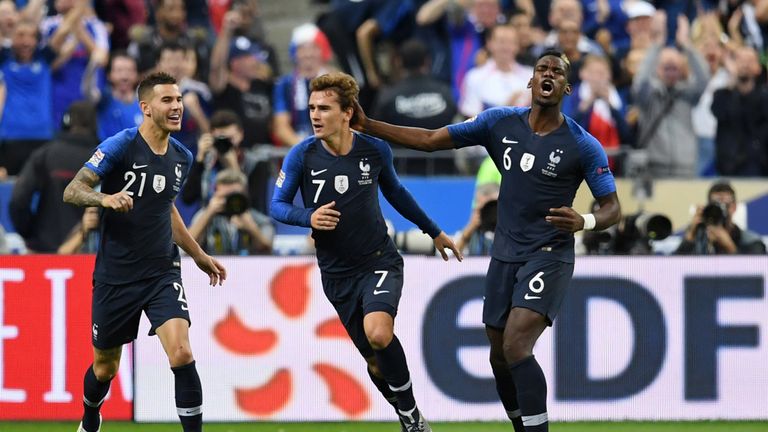 Antoine Griezmann celebrates scoring France's equaliser
