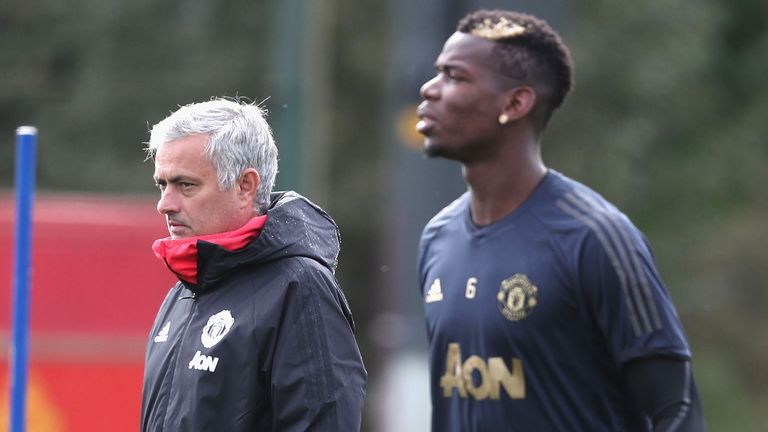 Manager Jose Mourinho and Paul Pogba of Manchester United in action during a first team training session at Aon Training Complex on October 1, 2018 in Manchester, England.