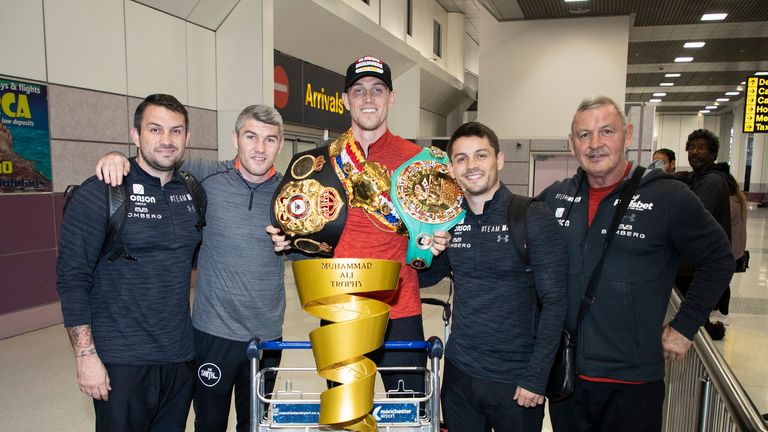 Boxer Callum Smith arrives back at Manchester airport with his brothers, Paul, Liam, Stephen and Dad Paul after beating George Groves lbinson..