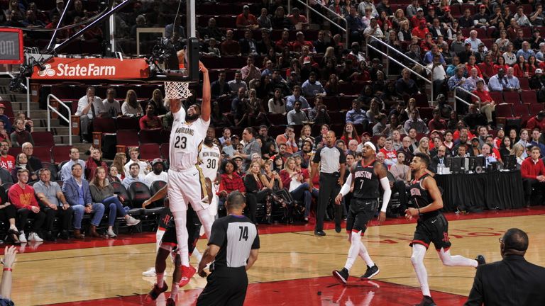 Anthony Davis #23 of the New Orleans Pelicans dunks the ball against the Houston Rockets during a game on October 17, 2018 at Toyota Center, in Houston, Texas.