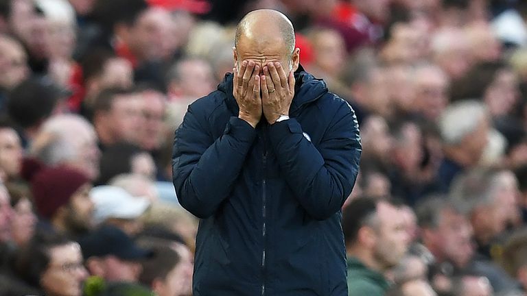 Pep Guardiola reacts after Virgil van Dijk appeared to handle the ball in the area