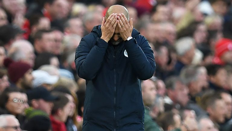 Pep Guardiola reacts after Virgil van Dijk appeared to handle the ball in the area