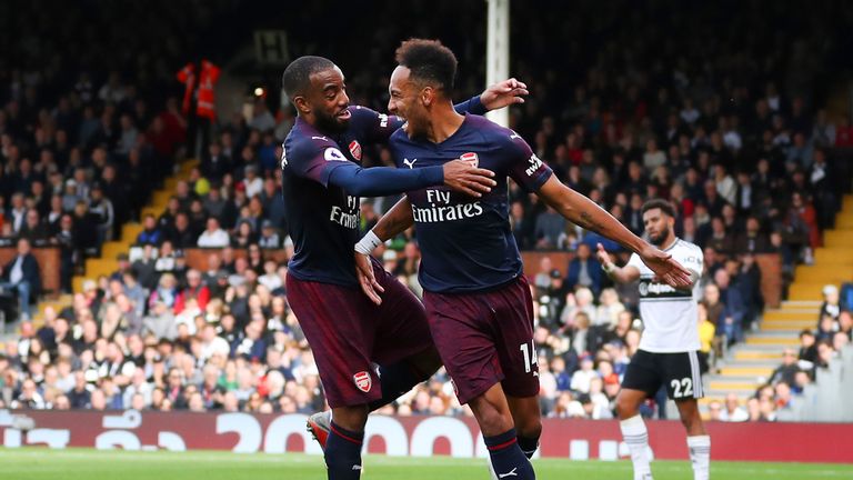 Pierre-Emerick Aubameyang celebrates his goal with team-mate Alexandre Lacazette