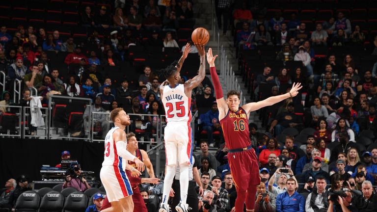 Reggie Bullock #25 of the Detroit Pistons shoots the ball against the Cleveland Cavaliers on October 25, 2018 at Little Caesars Arena in Detroit, Michigan.
