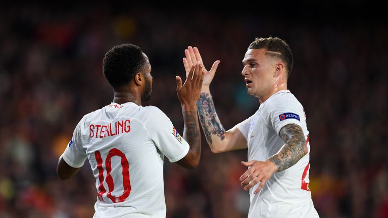 Raheem Sterling celebrates with Kieran Trippier