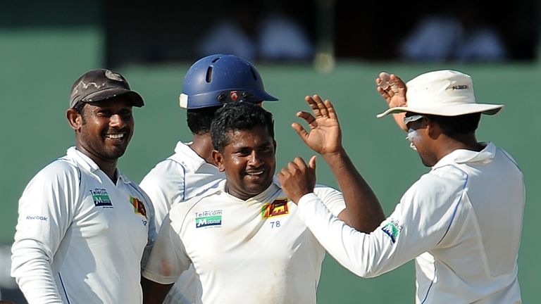 Rangana Herath celebrates the dismissal of Tim Bresnan in Colombo