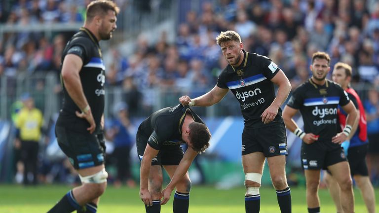 Rhys Priestland consoles teammate Freddie Burns who's try-scoring blunder cost Bath victory against Toulouse