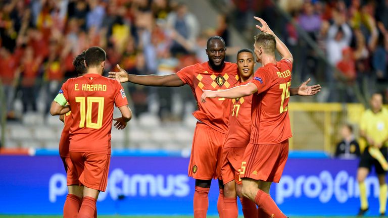 Romelu Lukaku is congratulated after opening the scoring for Belgium