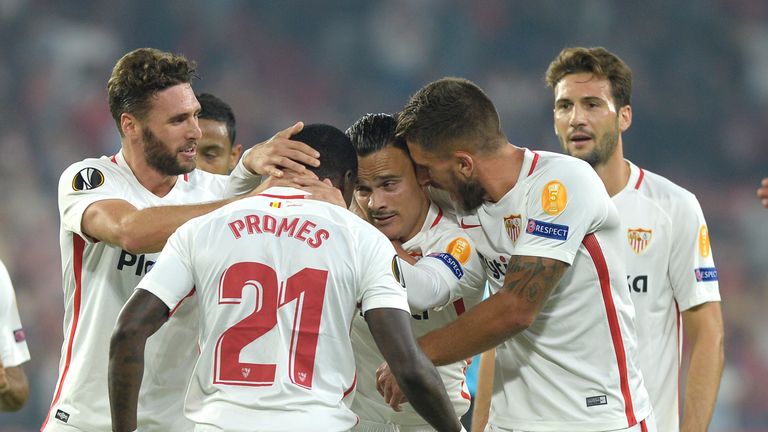 Sevilla's Spanish midfielder Roque Mesa (C) celebrates after scoring a goal against Akhisar's during the Europa League football match Sevilla against Akhisar at Ramon Sanchez Pizjuan stadium, in Sevilla on October 25, 2018. (Photo by CRISTINA QUICLER / AFP) (Photo credit should read CRISTINA QUICLER/AFP/Getty Images)
