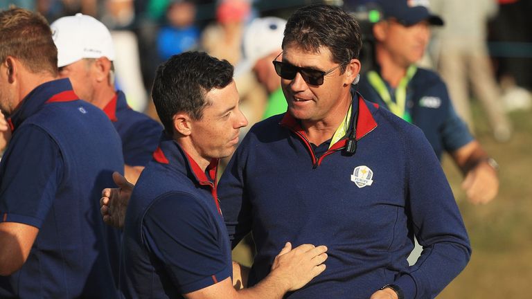 Rory McIlroy of Europe and Vice-Captain Padraig Harrington of Europe celebrate during the afternoon foursome matches of the 2018 Ryder Cup at Le Golf National on September 28, 2018 in Paris, France.