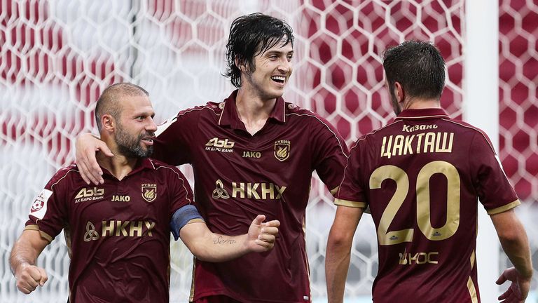 KAZAN, RUSSIA - JULY 29: Gokdeniz Karadeniz (L), Sardar Azmoun (C) and Mijo Caktash of FC Rubin Kazan celebrate goal during the Russian Premier League match between FC Rubin Kazan and FC Arsenal Tula at Kazan Arena stadium on July 29, 2017 in Kazan, Russia. (Photo by Epsilon/Getty Images)                                                 