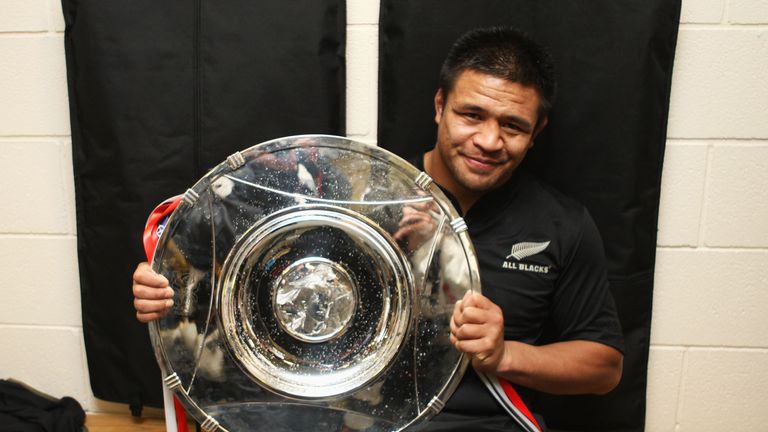 New Zealand's Keven Mealamu poses with the Hillary Shield following his side's victory over England at Twickenham in 2008