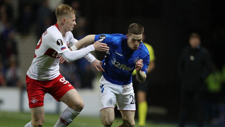 Rangers' Ryan Kent and Spartak Moscow's Nikolai Rasskazov battle for the ball