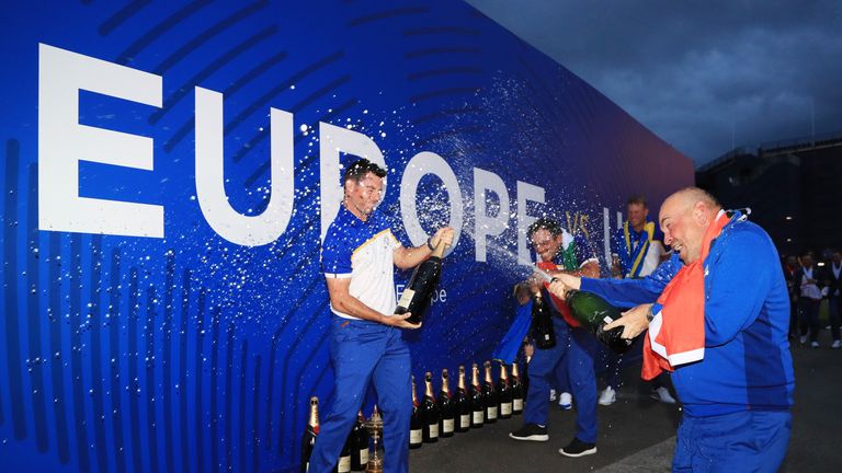 Rory McIlroy and Thomas Bjorn spray champagne after the singles matches of the 2018 Ryder Cup at Le Golf National on September 30, 2018 in Paris, France.