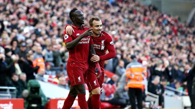 Sadio Mane celebrates his second goal with team-mate Xherdan Shaqiri