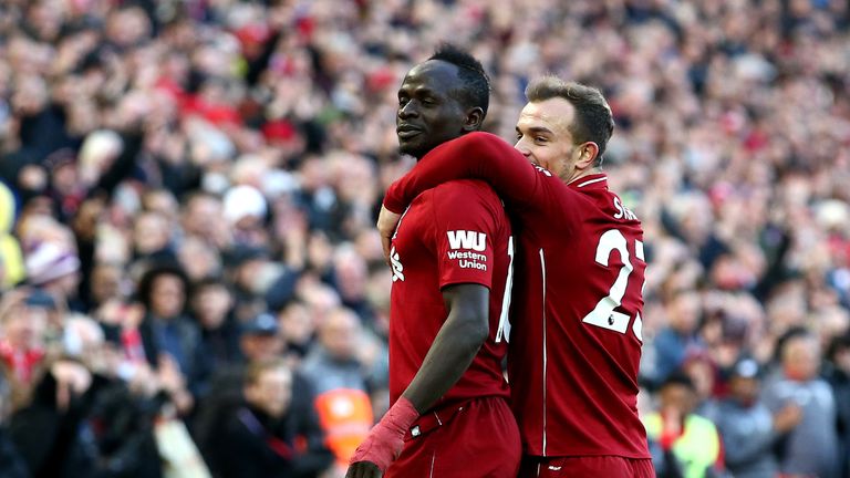 Sadio Mane celebrates his second goal with team-mate Xherdan Shaqiri