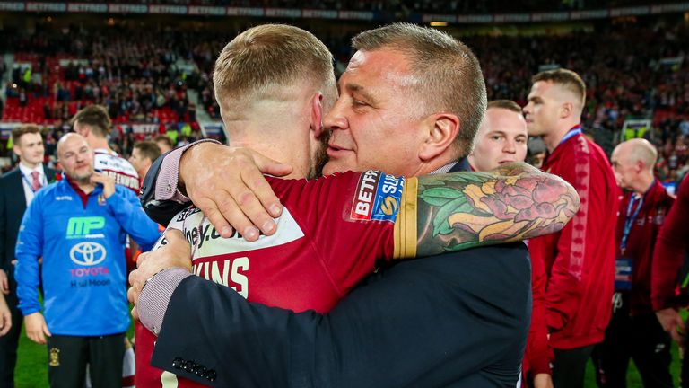Shaun Wane celebrates the win with Sam Tomkins.