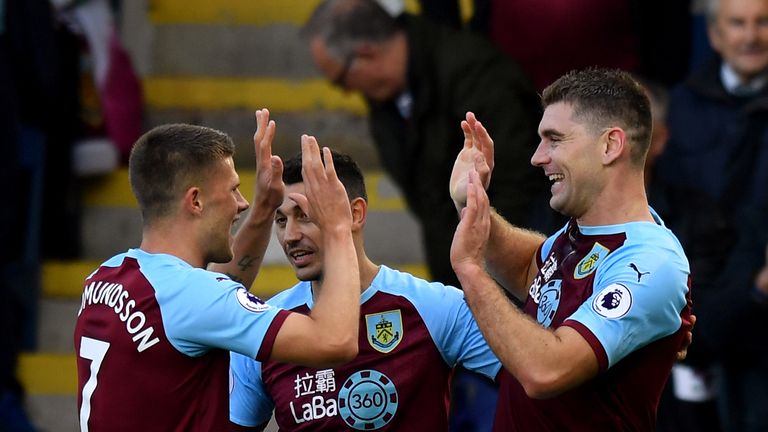 Burnley's Sam Vokes (right) celebrates scoring against Huddersfield                                                                                                                                                                                                                                                                                                                                                                                           