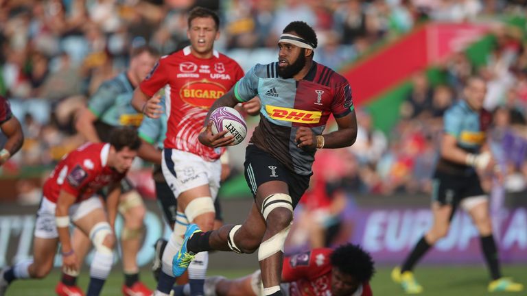 Semi Kunatani of Harlequins breaks to score his second try against Agen