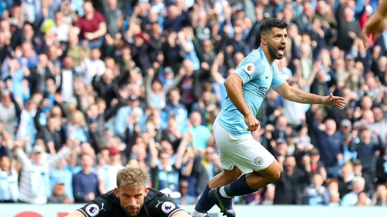 Sergio Aguero wheels away from goal after his opener