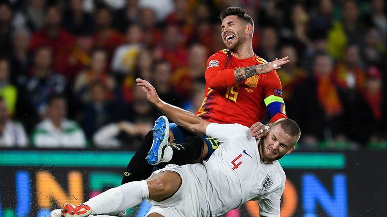 Sergio Ramos of Spain is challenged by Eric Dier of England during the UEFA Nations League A group four match between Spain and England at Estadio Benito Villamarin on October 15, 2018 in Seville, Spain.