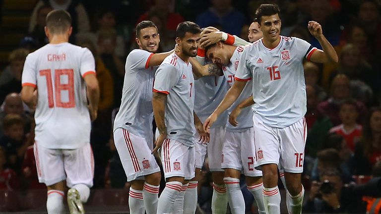 Spain celebrate after Marc Bartra put them 4-0 up