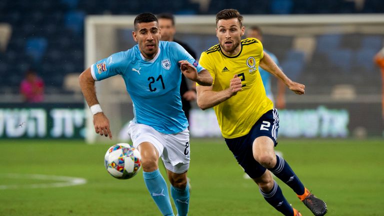 Scotland's Stephen O'Donnell chases down Israel's Eitan Tibi