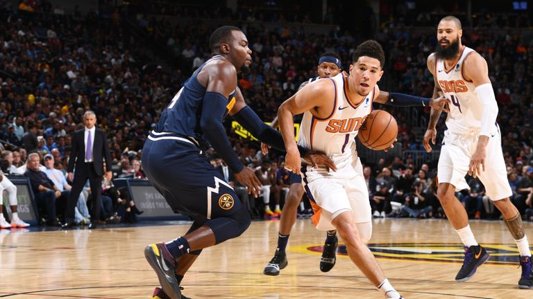 DENVER, CO - OCTOBER 20:  Devin Booker #1 of the Phoenix Suns handles the ball against the Denver Nuggets on October 20, 2018 at the Pepsi Center in Denver, Colorado. NOTE TO USER: User expressly acknowledges and agrees that, by downloading and/or using this Photograph, user is consenting to the terms and conditions of the Getty Images License Agreement. Mandatory Copyright Notice: Copyright 2018 NBAE (Photo by Garrett Ellwood/NBAE via Getty Images)