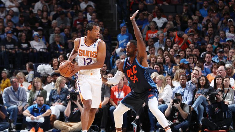 OKLAHOMA CITY, OK - OCTOBER 28:  TJ Warren #12 of the Phoenix Suns handles the ball against the Oklahoma City Thunder on October 28, 2018 at Chesapeake Energy Arena in Oklahoma City, Oklahoma. NOTE TO USER: User expressly acknowledges and agrees that, by downloading and/or using this photograph, user is consenting to the terms and conditions of the Getty Images License Agreement. Mandatory Copyright Notice: Copyright 2018 NBAE (Photo by Zach Beeker/NBAE via Getty Images)