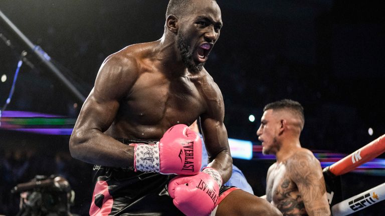 OMAHA, NE - OCTOBER 13:Jose Benavidez (red/yellow trunks) and Bud Crawford (black/pink trunks) exchange blows during their match at at CHI Health Center on October 13, 2018 in Omaha, Nebraska. Crawford won via TKO in the 12th round.. (Photo by Eric Francis/Getty Images)