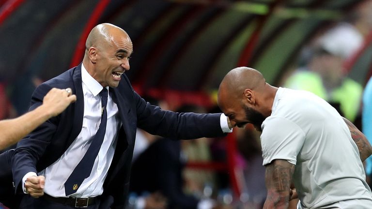 Roberto Martinez, Head coach of Belgium celebrates with Belgium assistant coach, Thierry Henry after their sides first goal during the 2018 FIFA World Cup Russia Quarter Final match between Brazil and Belgium at Kazan Arena on July 6, 2018 in Kazan, Russia.