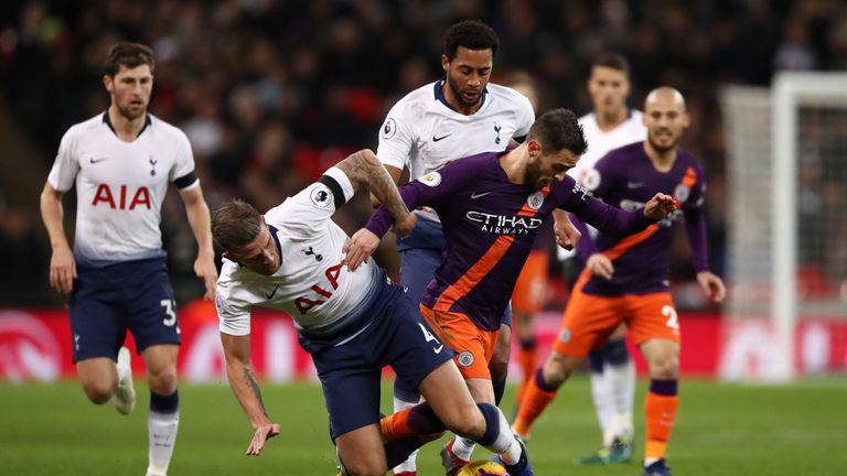 Tottenham Hotspur's Toby Alderweireld and Manchester City's Bernardo Silva battle for the ball