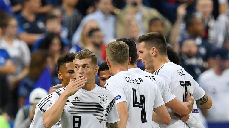 Toni Kroos celebrates putting Germany ahead from the penalty spot