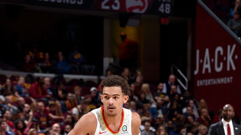 CLEVELAND, OH - OCTOBER 21: Trae Young #11 of the Atlanta Hawks handles the ball against the Cleveland Cavaliers on October 21, 2018 at Quicken Loans Arena in Cleveland, Ohio. NOTE TO USER: User expressly acknowledges and agrees that, by downloading and/or using this photograph, user is consenting to the terms and conditions of the Getty Images License Agreement. Mandatory Copyright Notice: Copyright 2018 NBAE (Photo by David Liam Kyle/NBAE via Getty Images)