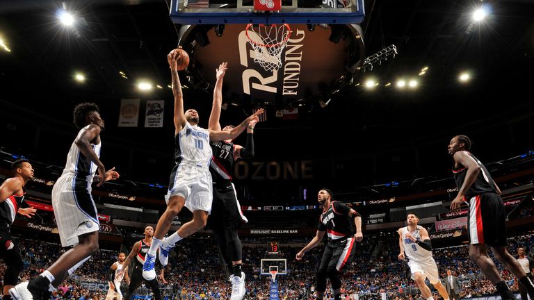 Evan Fournier #10 of the Orlando Magic goes to the basket against the Portland Trail Blazers on October 25, 2018 at Amway Center in Orlando, Florida