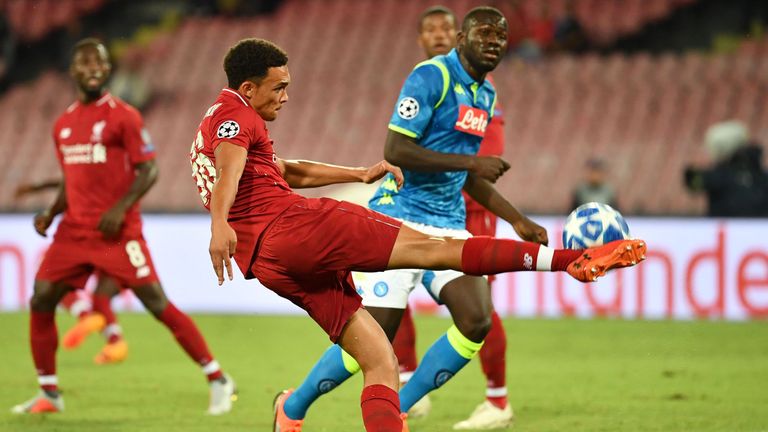 Trent Alexander-Arnold clears the ball against Napoli